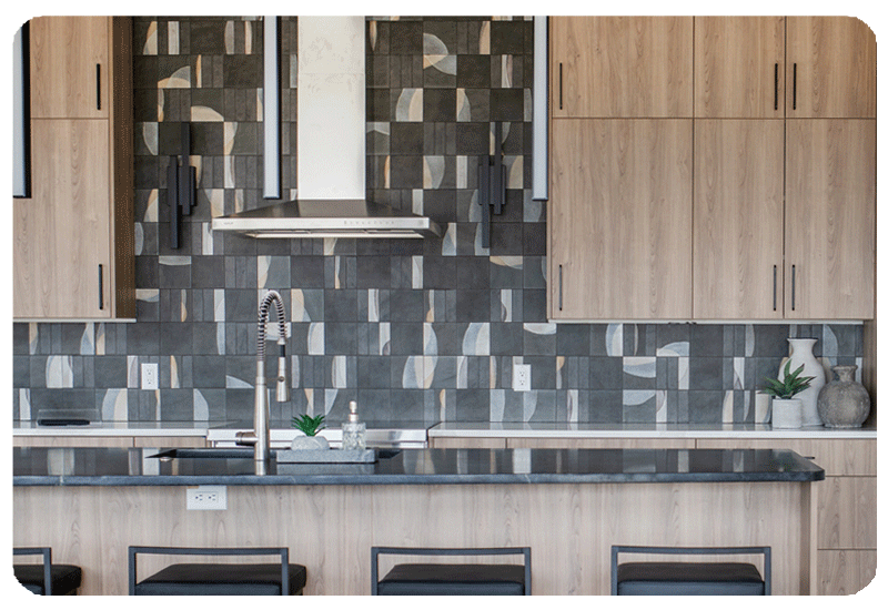 When it comes to modern kitchen backsplashes, builders, remodelers, designers and homeowners are embracing counter-to-ceiling installation. This approach makes the kitchen feel more expansive because it draws the eye up. A counter-to-ceiling backsplash will draw attention to your beautiful cupboards and other features like an interesting oven hood. 