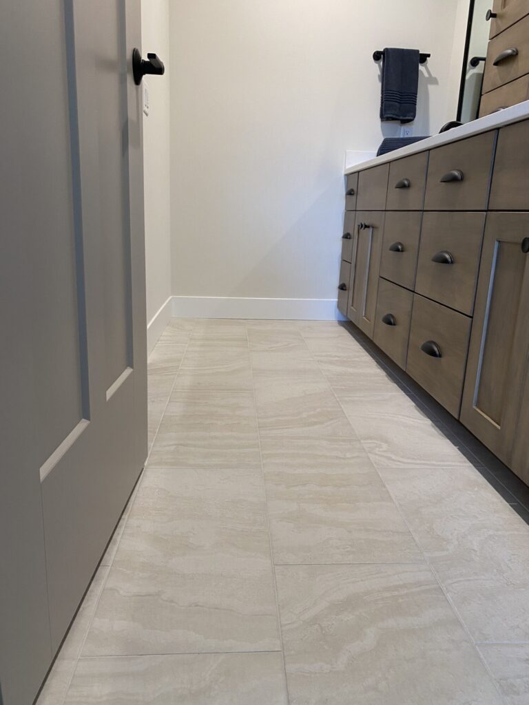 grey and white marble tile floor in bathroom