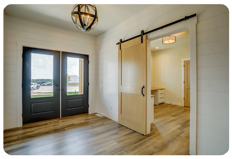 entryway in a home with wood look luxury vinyl plank flooring
