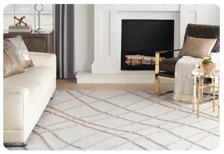 white area rug placed near a fireplace with beige color curvy linear pattern