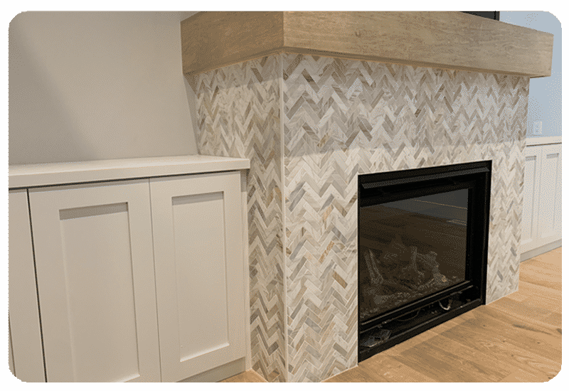 herringbone stone tile fireplace