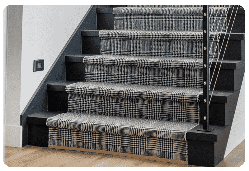 black and white carpeted staircase