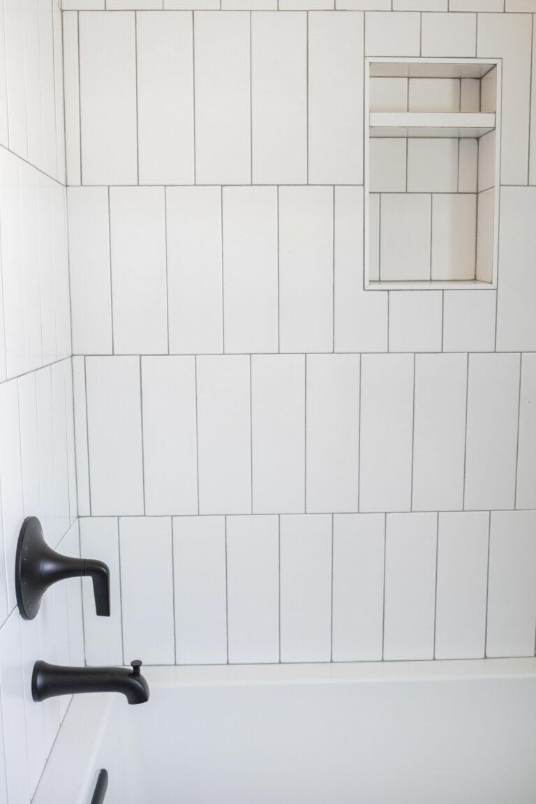 white tile vertical installation shower