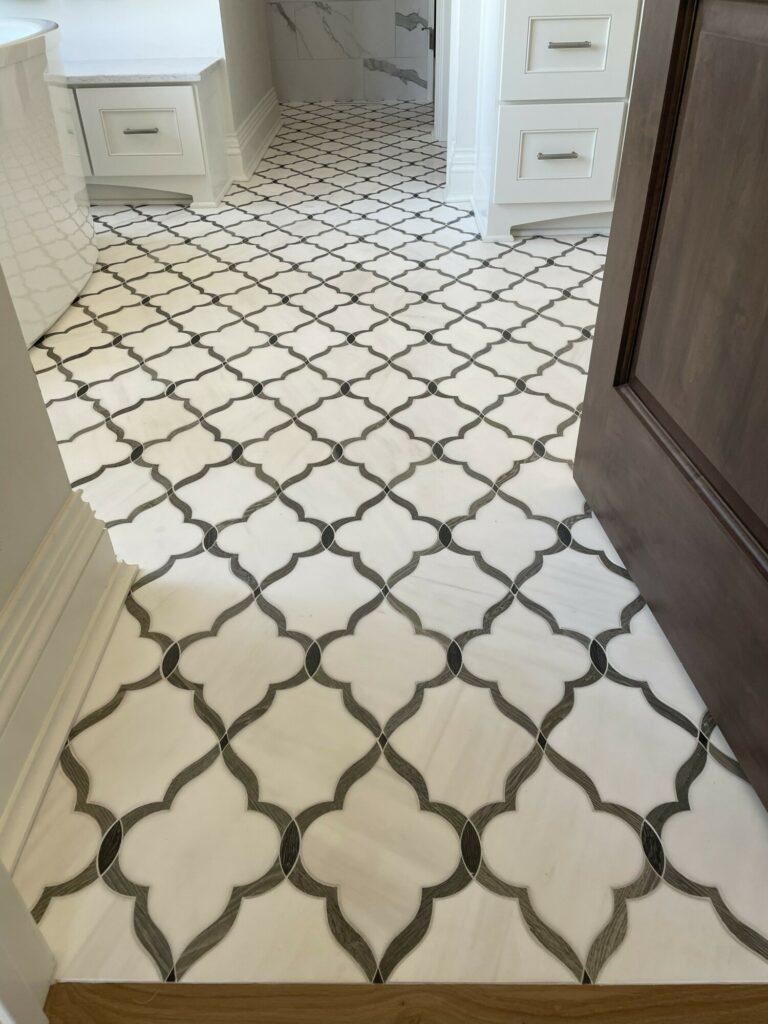 white and black outline tile floor