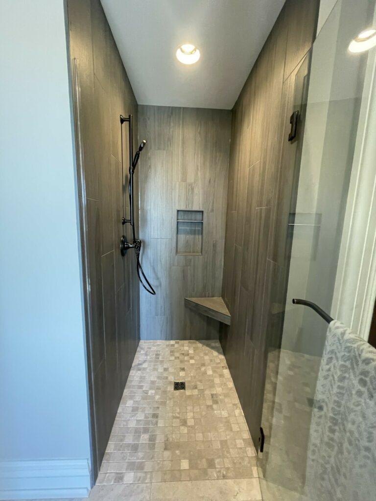 vertical tile shower alcove