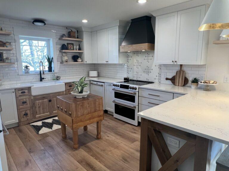 luxury vinyl plank kitchen floor white tile backsplash