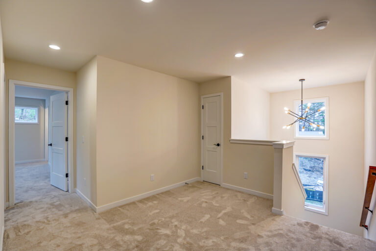 wall to wall carpeting common hallway