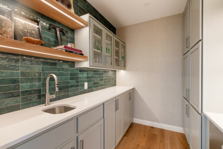 green tile backsplash in the butlers pantry