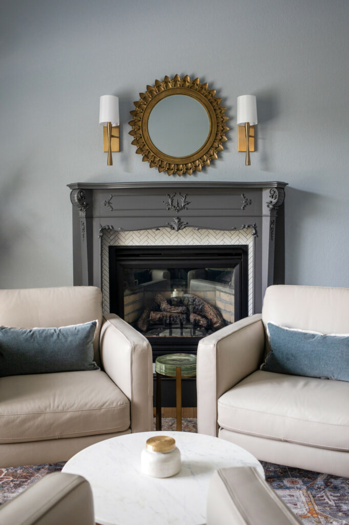 grey fireplace mantel with cream tile surround