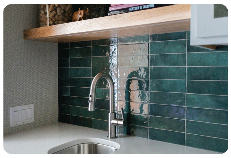 green zellige tile backsplash in laundry room