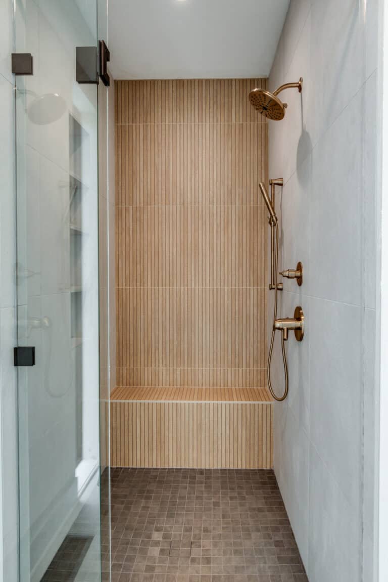 walk in shower vertical lines brown and white tile