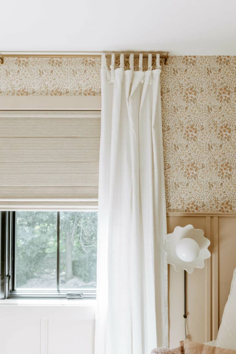 Custom hunter douglas window treatments with black out shades for a nursery in blush pink