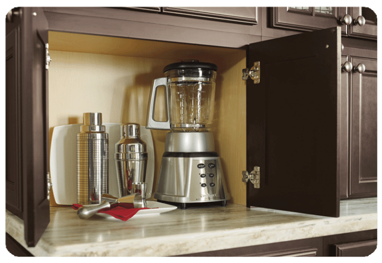 custom cabinet dark wood showing hidden drink station with blender and martini shaker