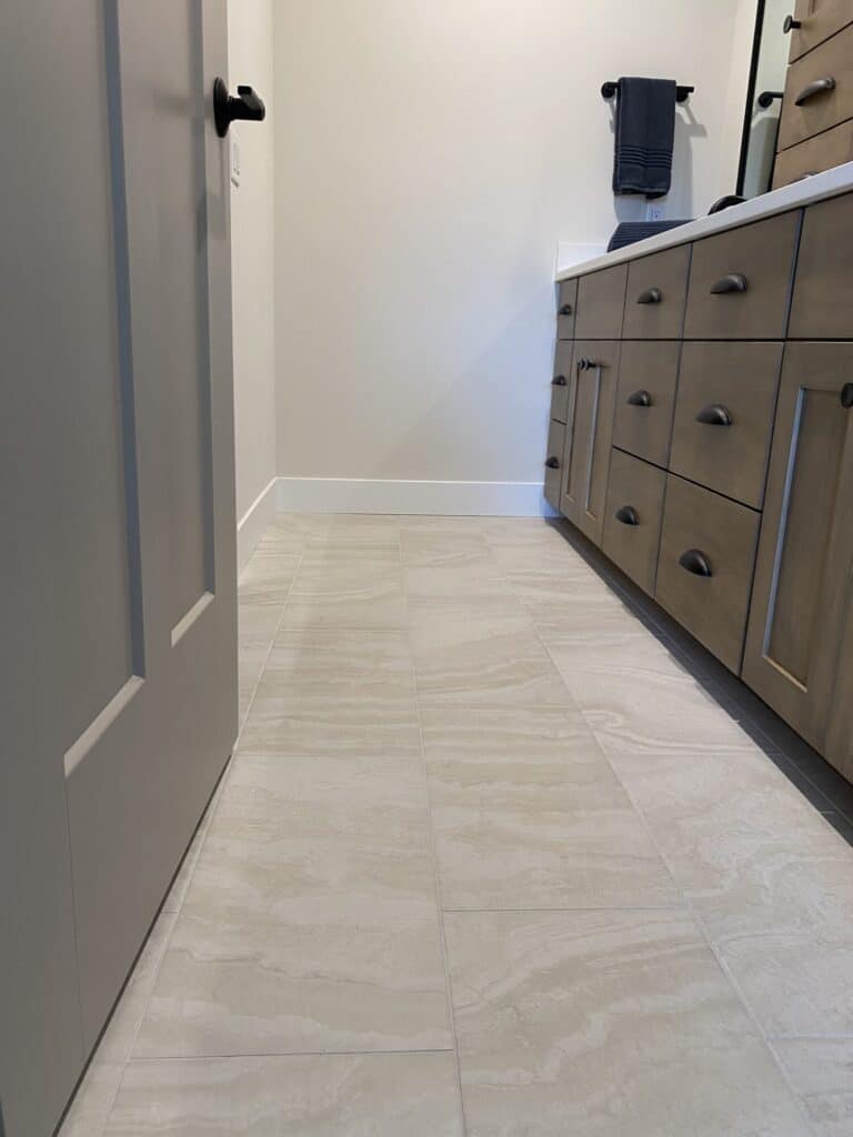 grey and white marble tile floor in bathroom