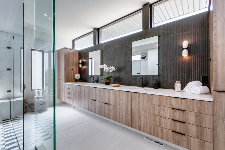 white tile floor wood floating double vanity dark grey wall tile