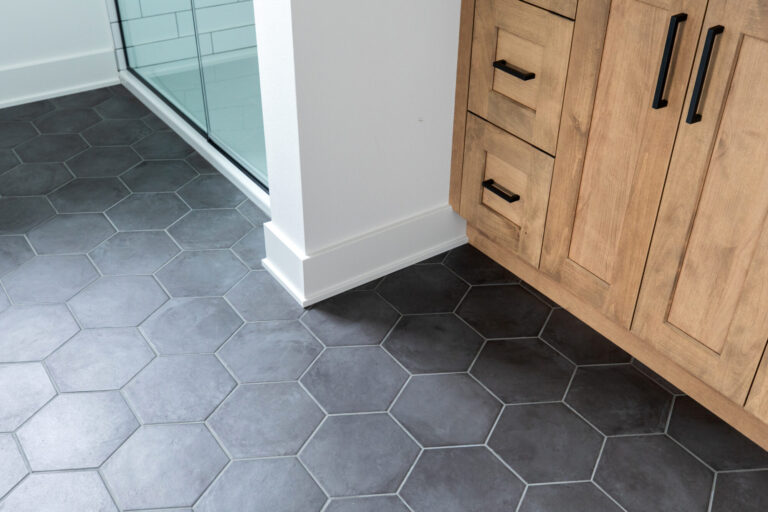 dark grey hexagon tile bathroom floor