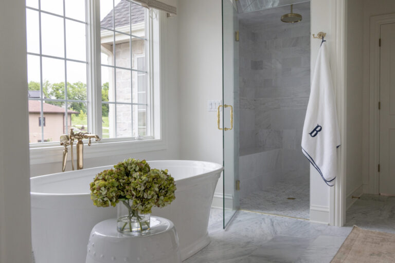 grey stone tile shower wall and floor