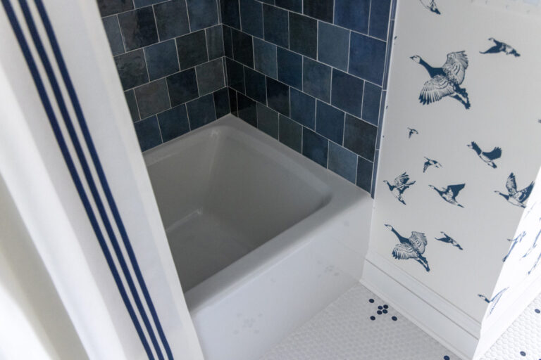 white marble tile floor white free standing tub in glass enclosure