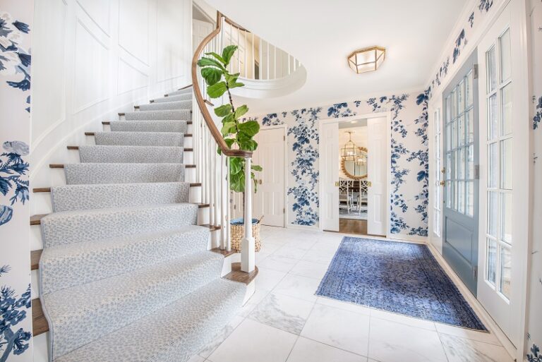 blue pattern stair runner on curved stair case