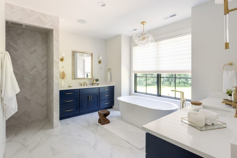 primary bathroom with marble tile floor