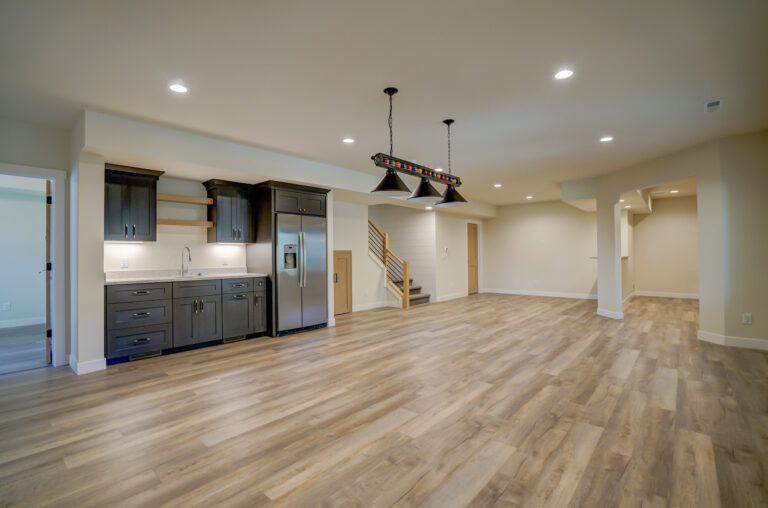 lower level with luxury vinyl plank wood look flooring