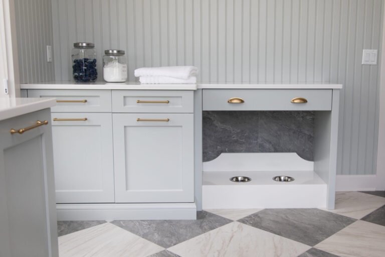 grey and white marble tile checkerboard flooring in laundry room