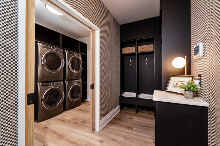 laundry room same luxury vinyl plank flooring as the common area