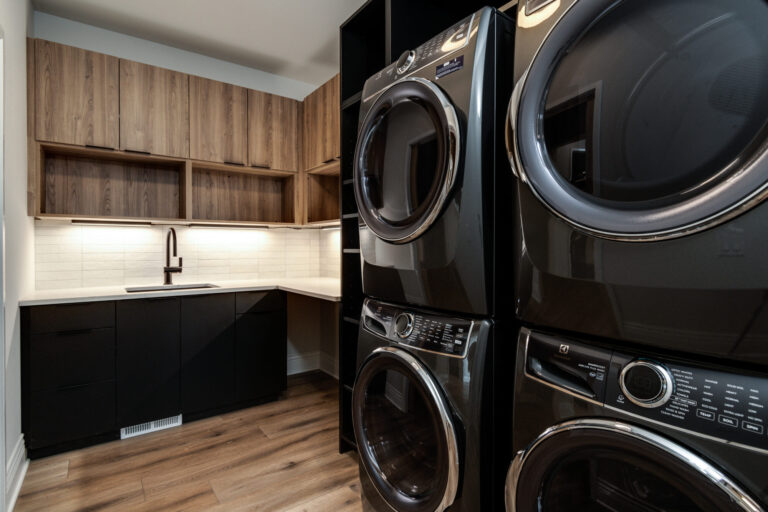 laundry room with wood look luxury vinyl plank flooring