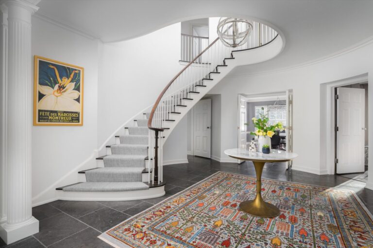 grey carpet stair runner on curved stair case