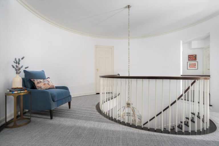 light grey carpet stair runner continues in upstairs hallway