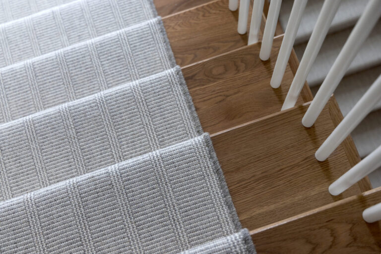 grey carpet stair runner with hardwood stairs