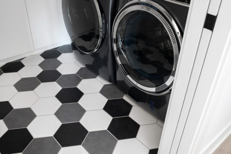 black white grey hexagon tile floor in laundry room