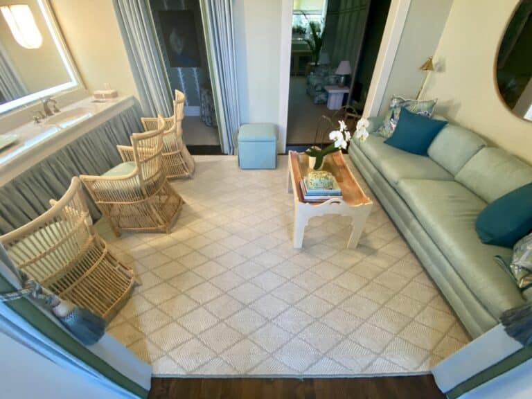 madcap lounge milwaukee lounge site with seafoam green couch and diamond pattern area rug