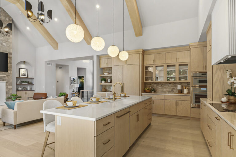 open concept kitchen and living room with oak hardwood floor