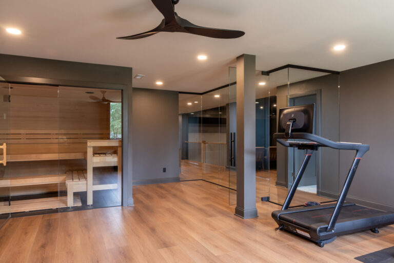 wood look luxury vinyl plank in a lower level fitness room