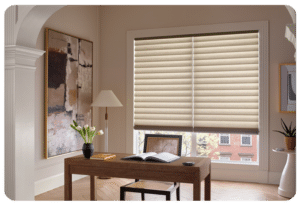 hunter douglas window covering roman shades cream color behind a home office desk