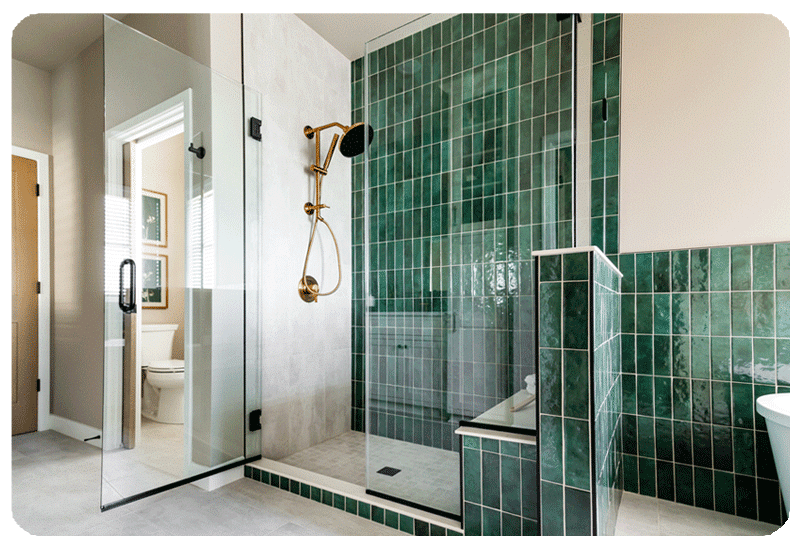 Green glazed wall tile in a walk-in shower in a Milwaukee bathroom